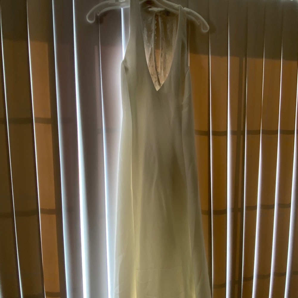 Brand new size 12 wedding gown never altered/worn